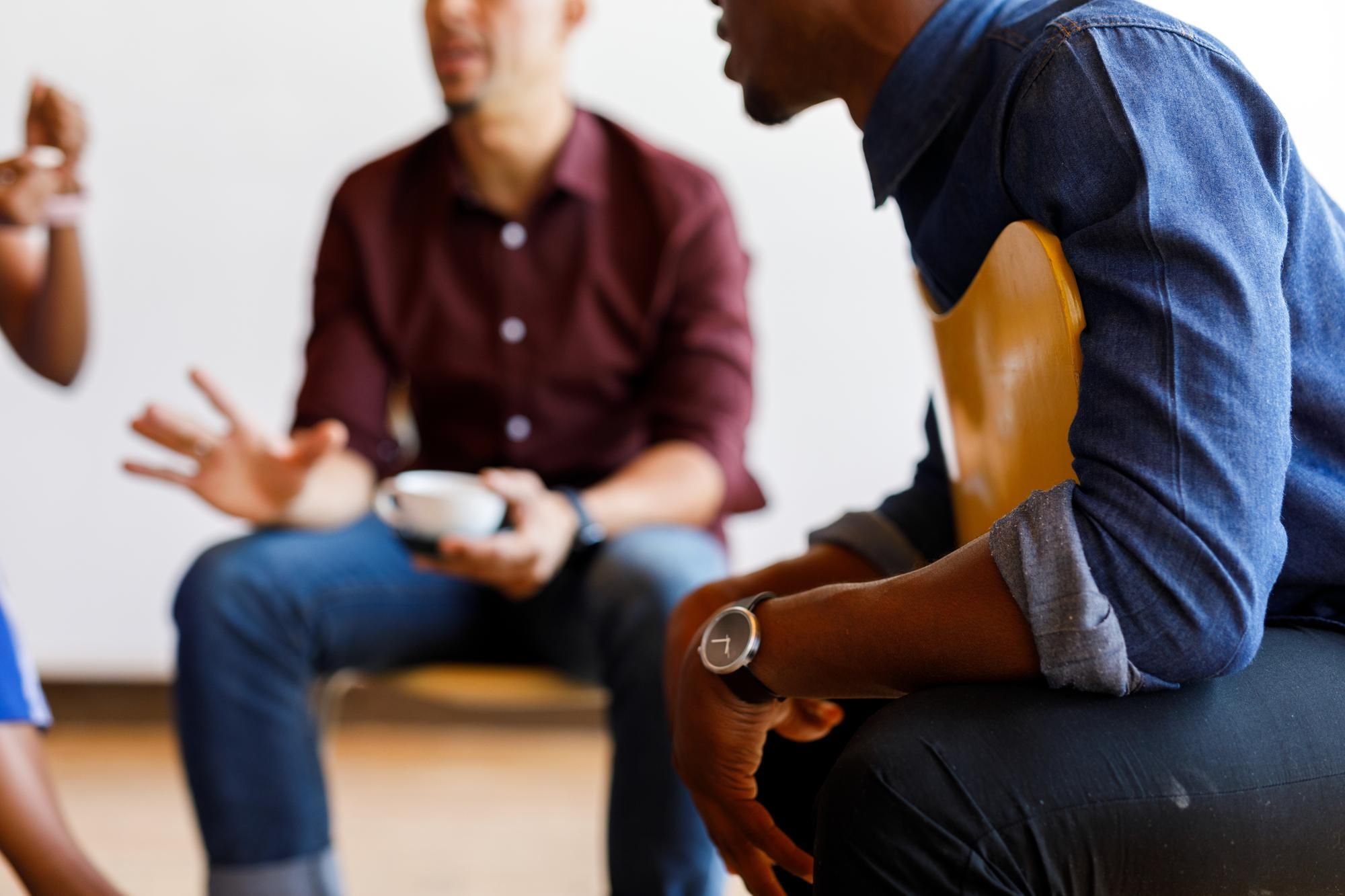 People around a circle talking