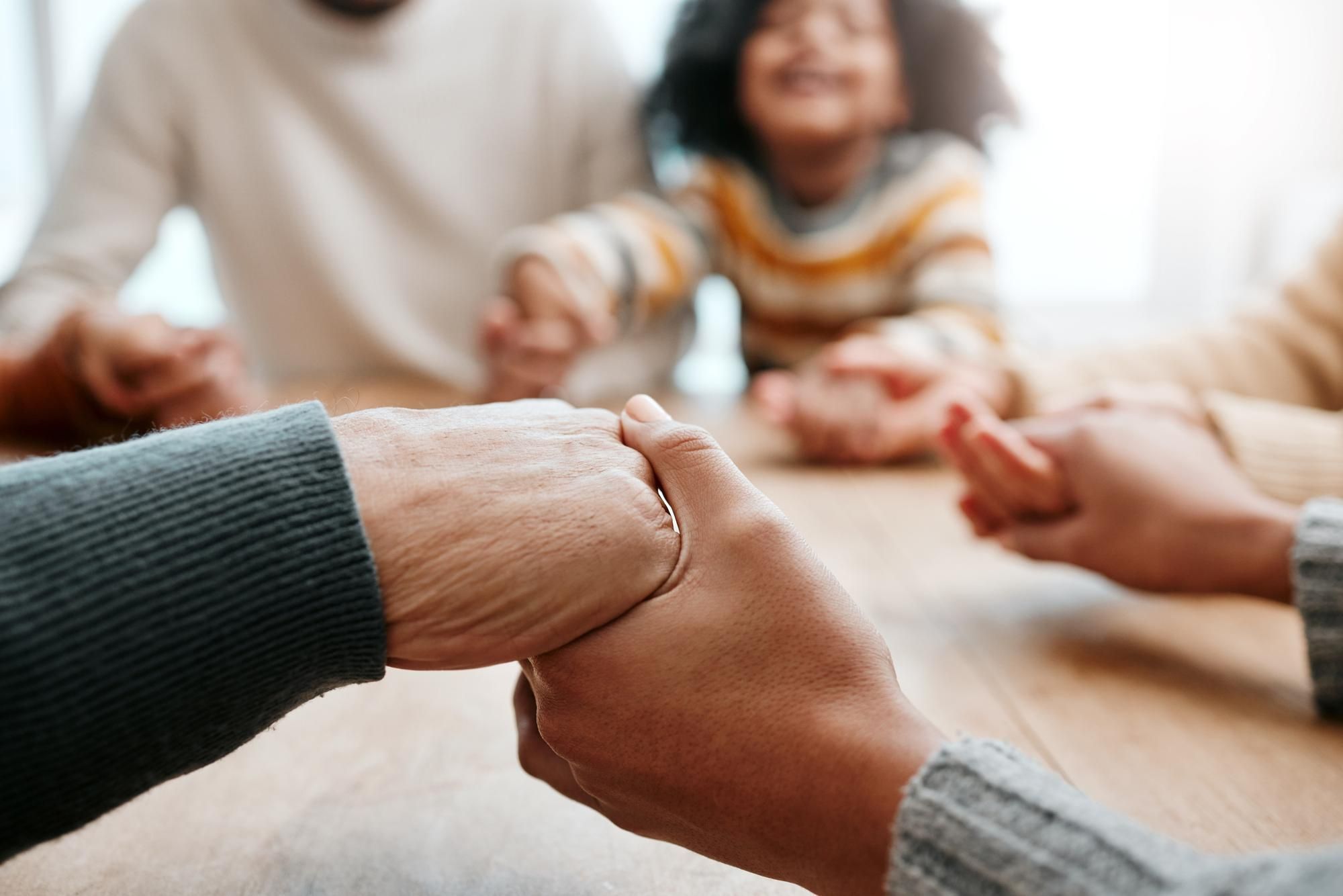 A family holding hands