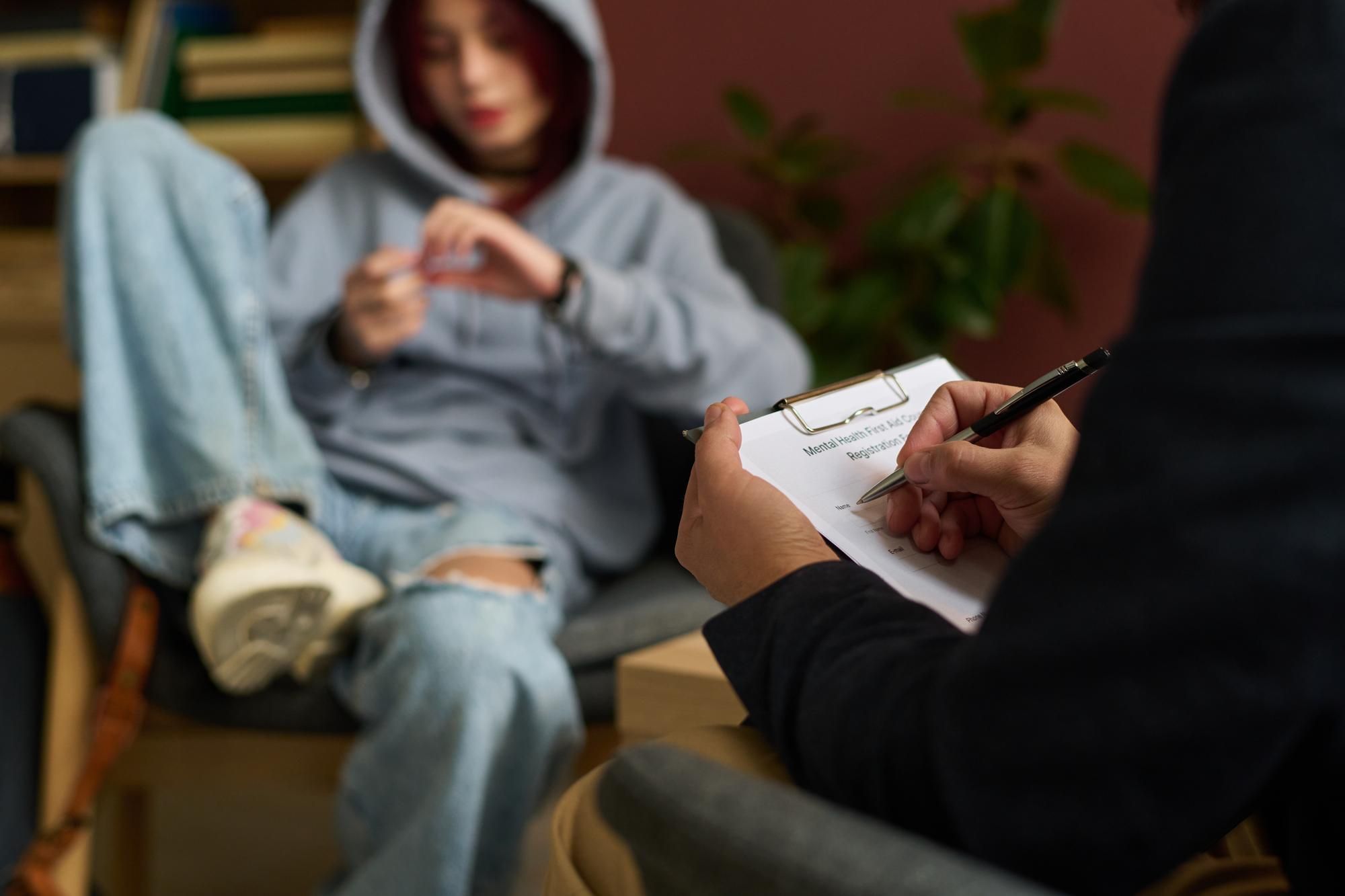 Young person with therapist