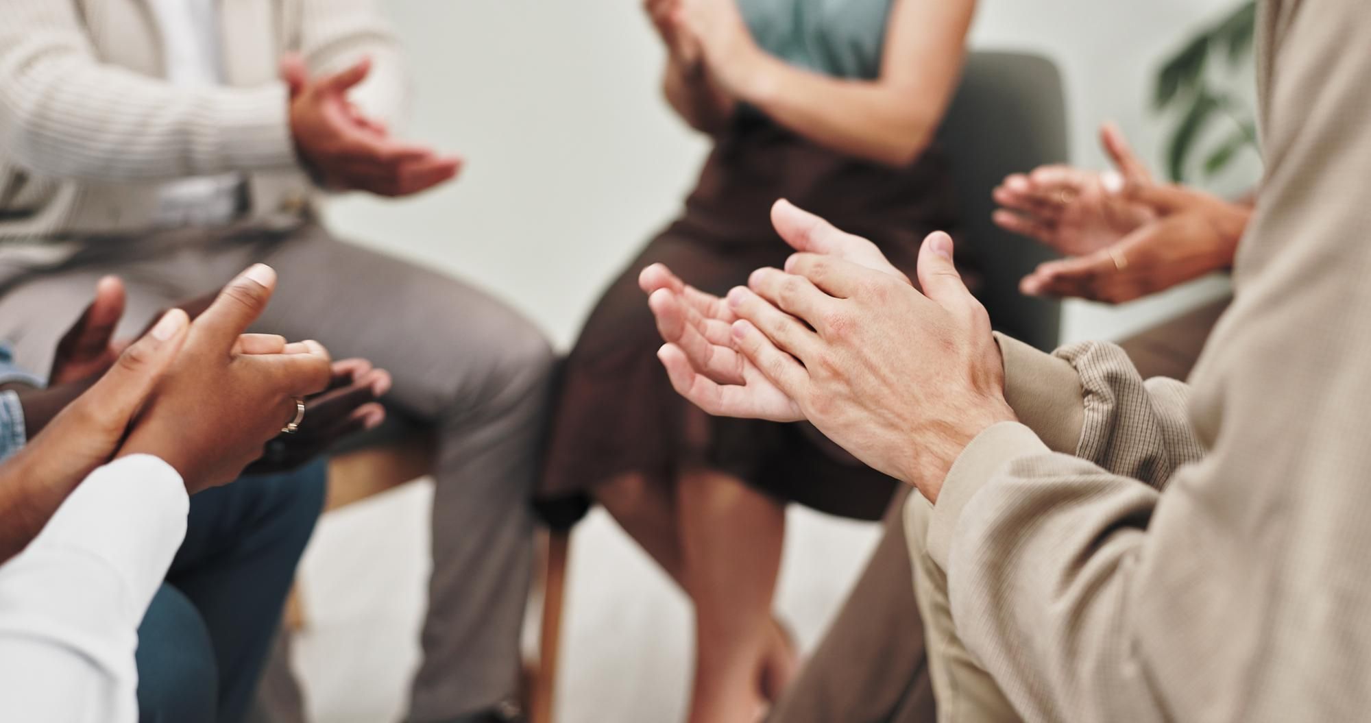 Group of people clapping
