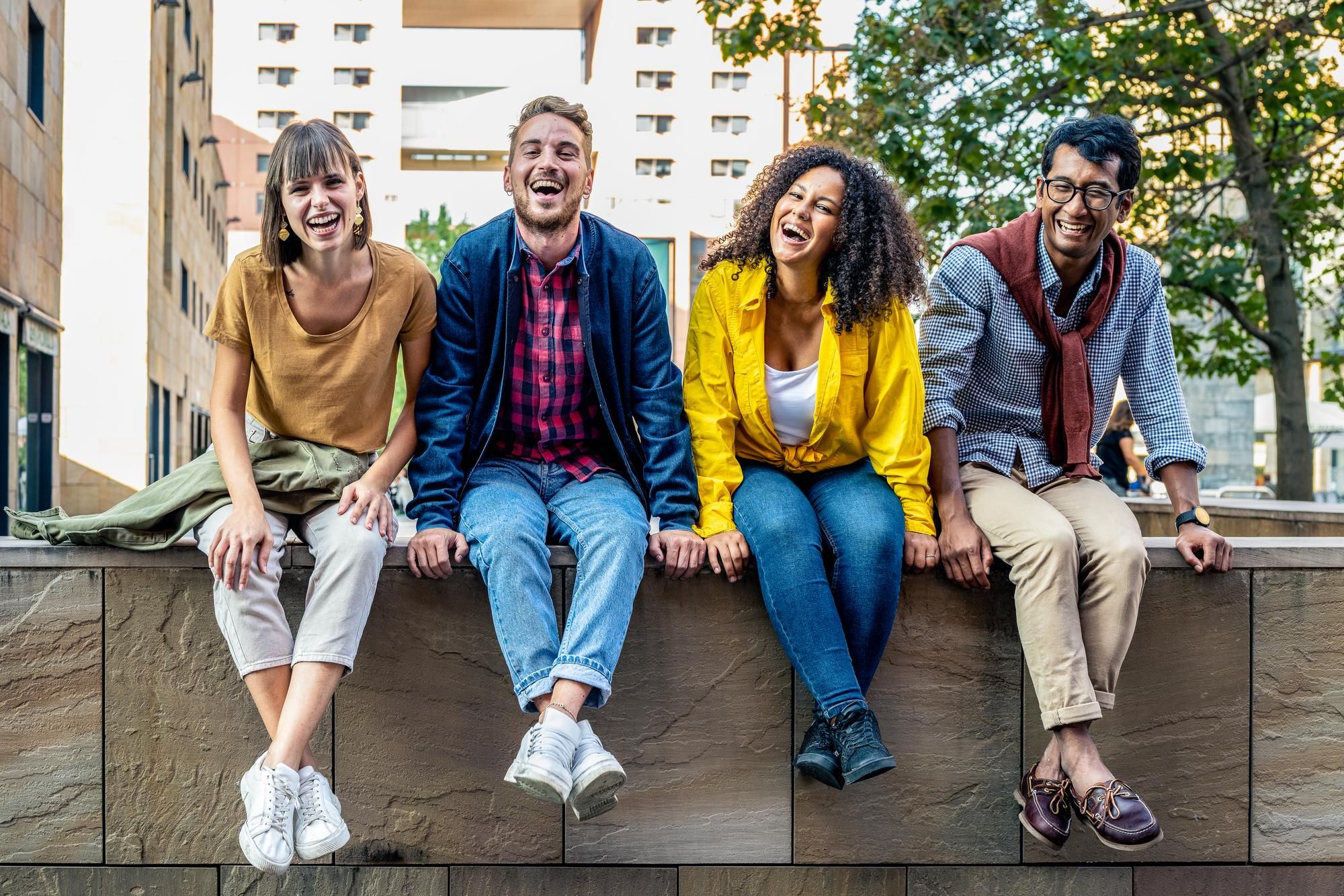 People together sitting on a bench